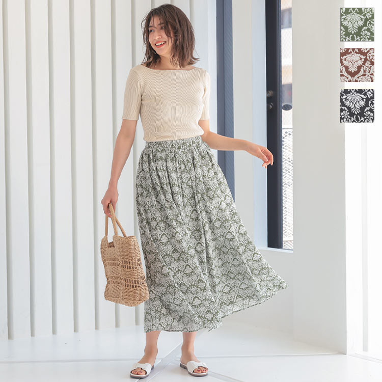 COMME des GARÇONS 黒とオレンジの花柄 ガウチョパンツ