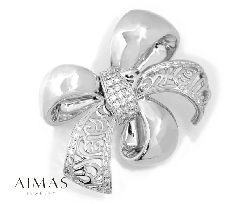 平和堂貿易動くブローチ刻印あり金750PT950ダイヤモンド0、28