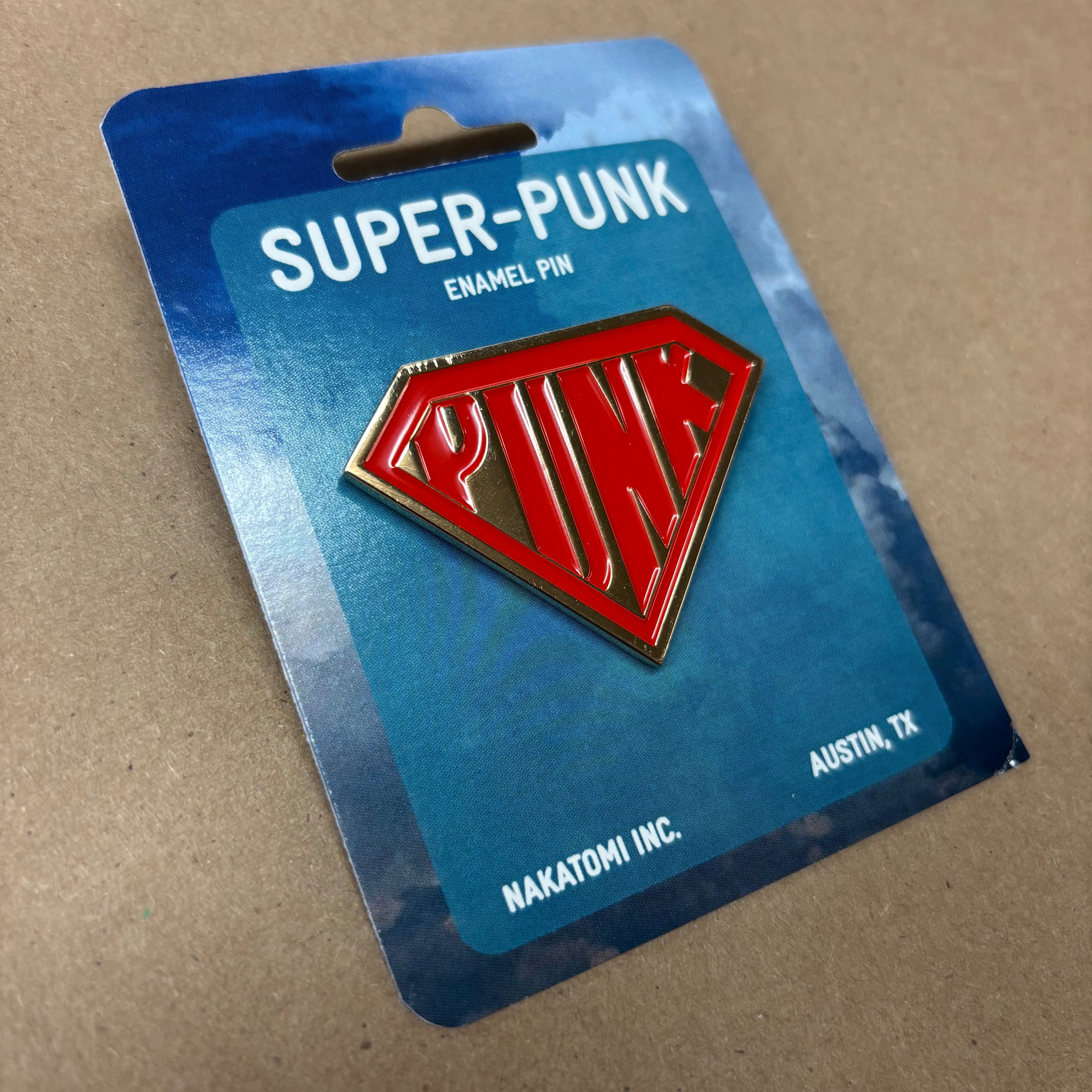 Super-Punk Enamel Pin – Nakatomi, Inc