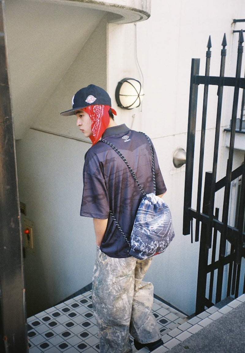 9090 × umbro Printed Game Knapsack – YZ