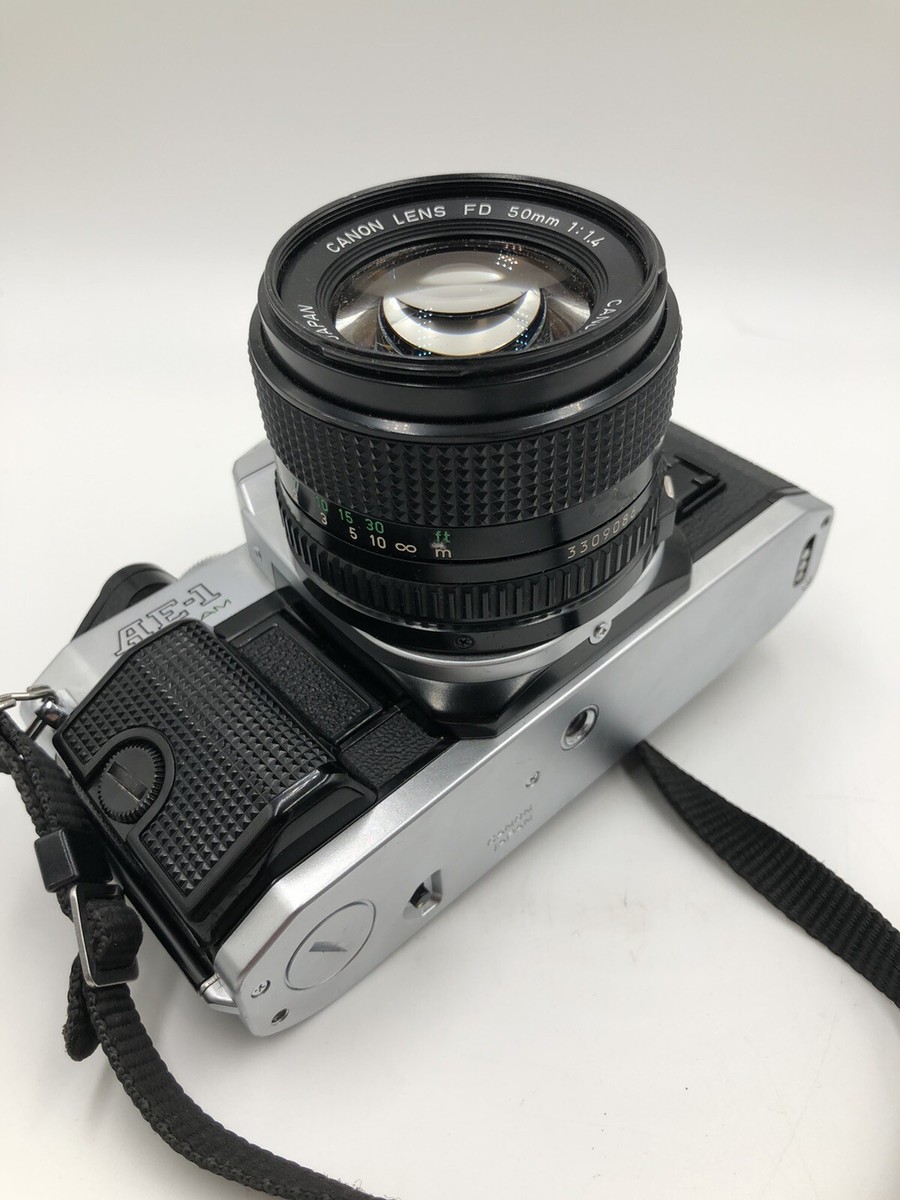 Canon AE-1 program 35mm film camera With Canon Fd 50mm f/1.4 Lens
