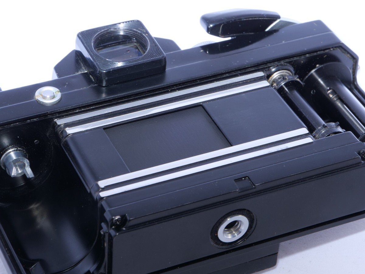 Vintage black Nikon F APOLLO 35mm SLR Film Camera. Eye Level Prism