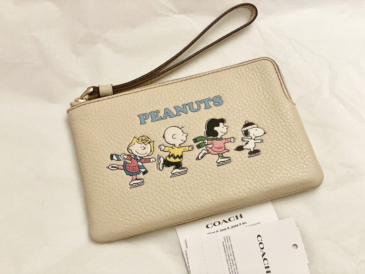 Coach X Peanuts Corner Zip Wristlet With Snoopy And Friends Motif