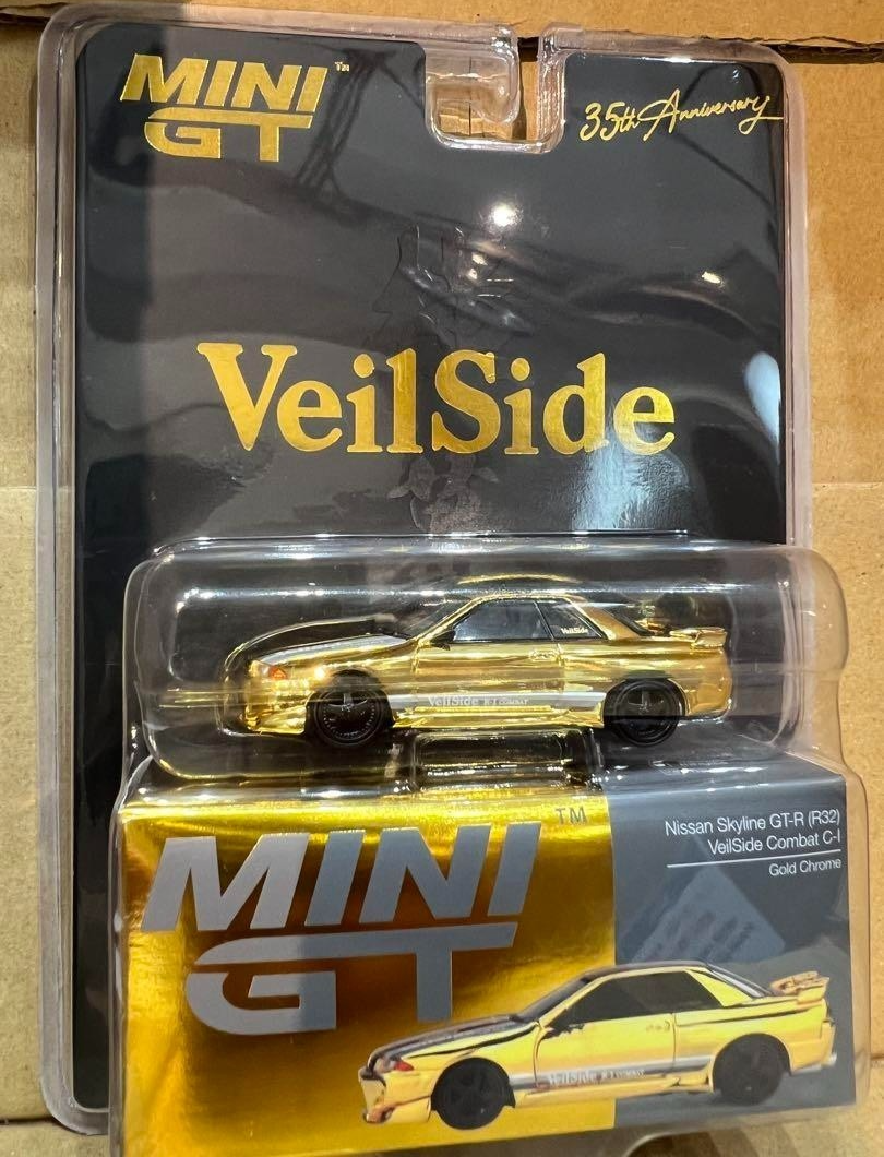 MINI GT VeilSide Nissan Skyline GT-R R32 Combat C-I Gold Chrome 1