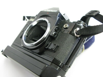 Canon A-1 film camera body with Genuine strap and Power Winder A2