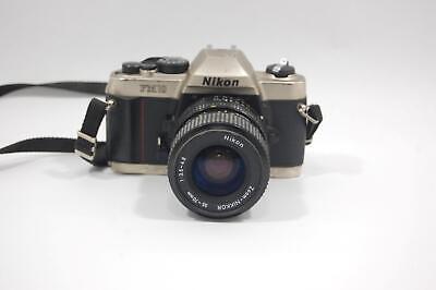 Read Nikon FM-10 SLR Camera with 35-70mm 1:5-4.8 Zoom Lens
