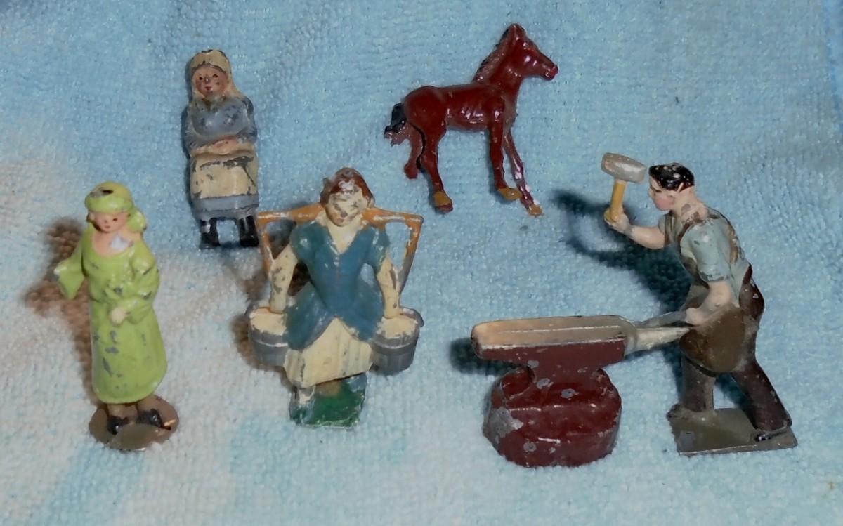 50sJ.Hill & Co.鉛製フィギュアイギリス製 一輪車を引く男ビンテージ