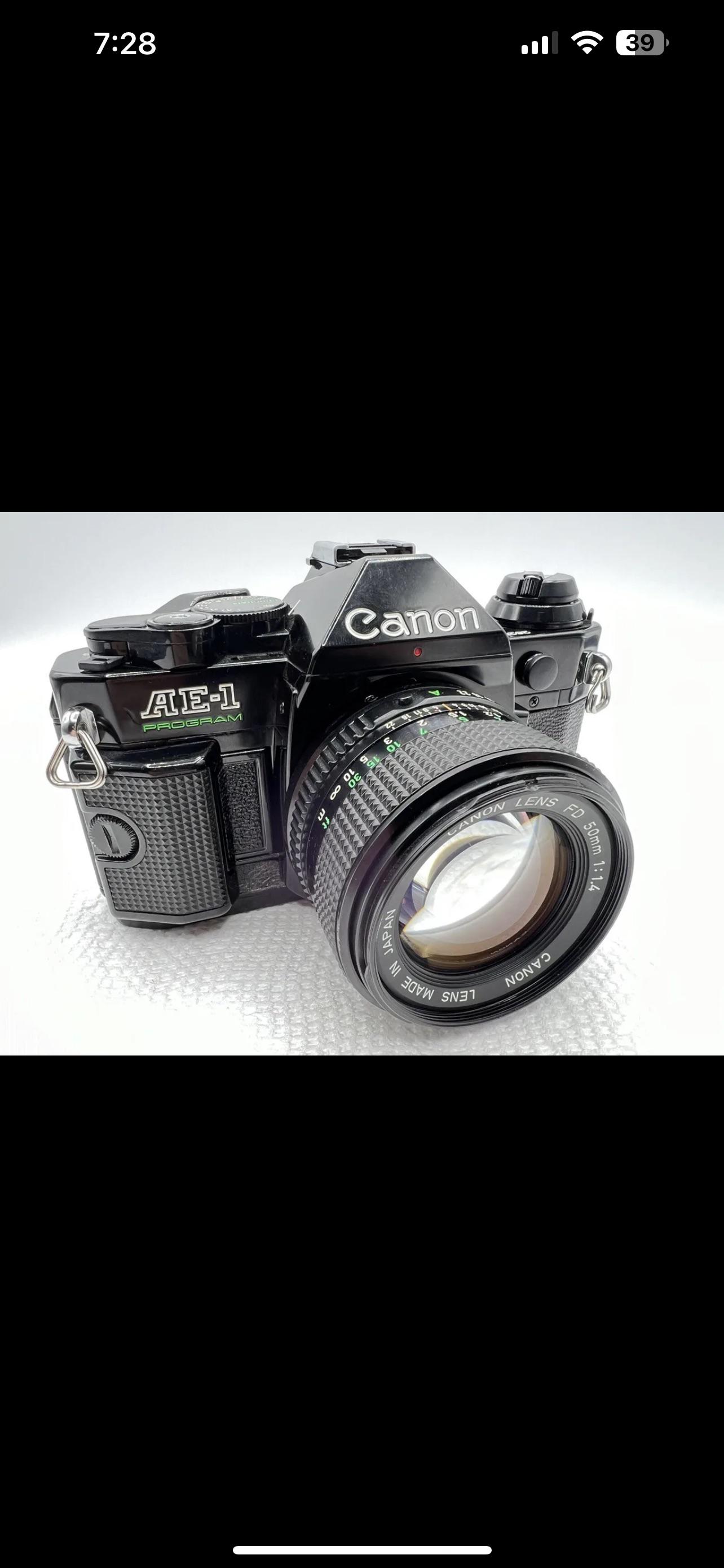 Black canon ae-1 for 179 in excellent condition w/lens : r