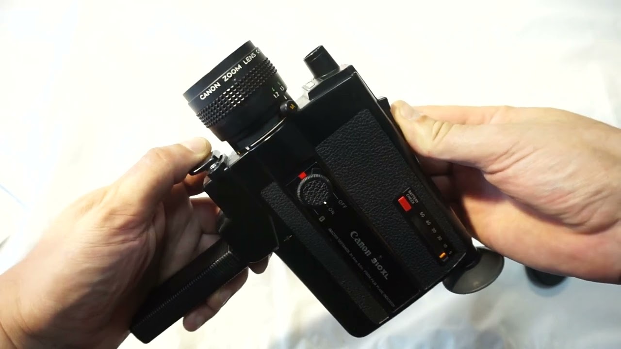 Canon 310XL loading Super 8 film and batteries on Canon 310XL +