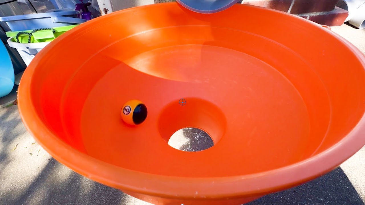 Orange Hole Tunnel + Continuously Spinning Billiard Ball Artist
