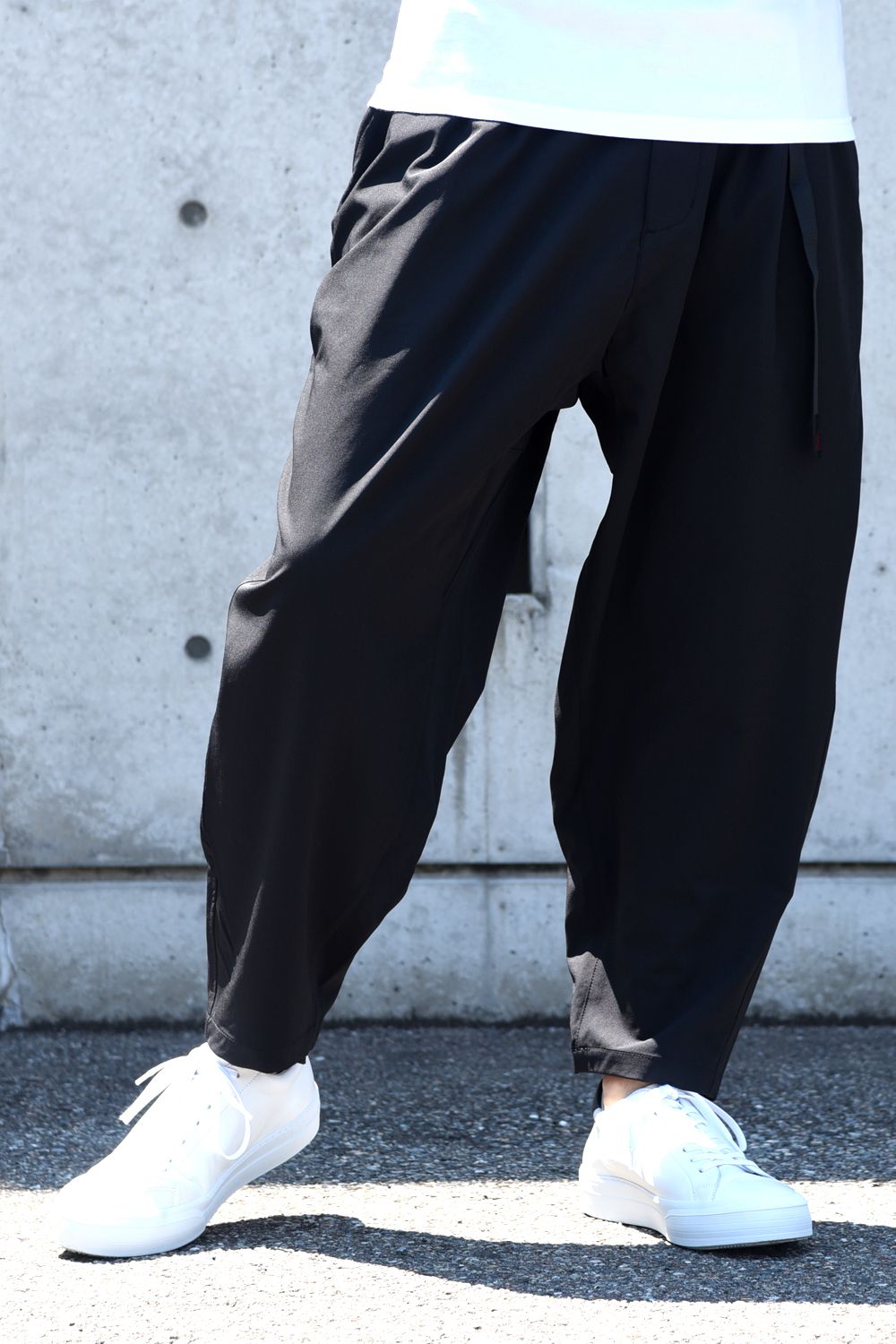 White Mountaineering - WM x GRAMICCI STRETCHED SAROUEL PANTS