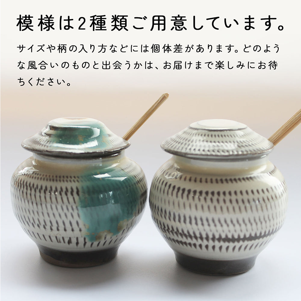 小鹿田焼の大きい壺 黒に黄土色の釉薬の流れ模様の