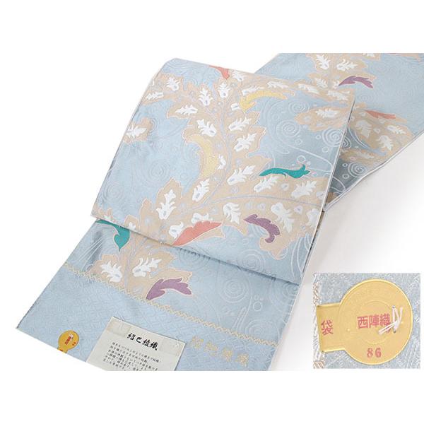 袋帯 絹 仕立て付き 水色 蔦 水紋 六通 西陣織 辻梅機業店謹製 証紙