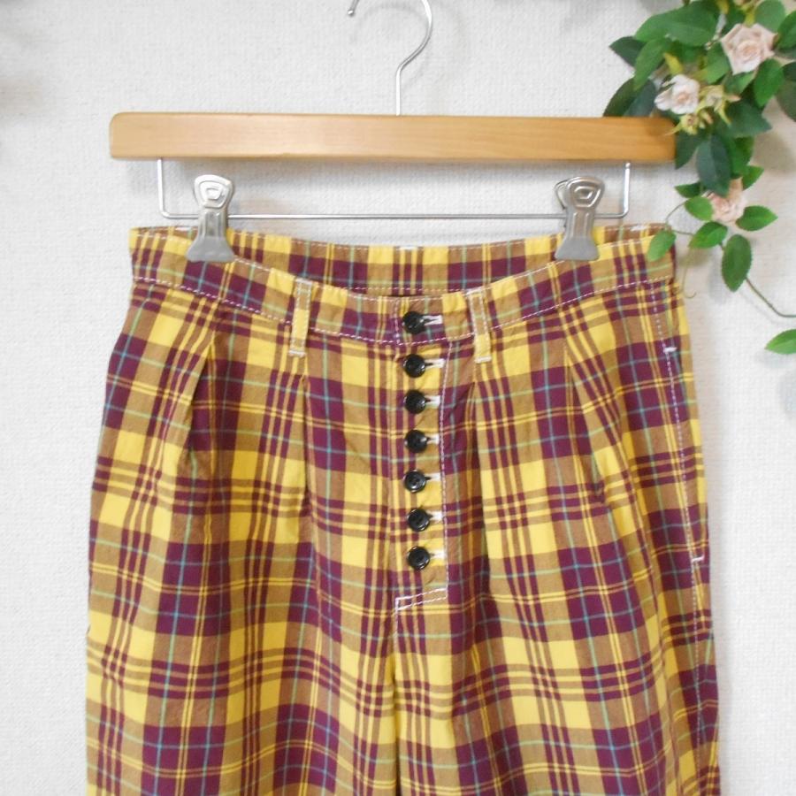 COMME des GARÇONS 黒とオレンジの花柄 ガウチョパンツ