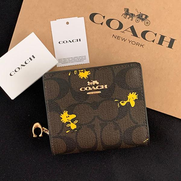 COACH（コーチ） 二つ折り財布 シグネチャー スヌーピー ウッド