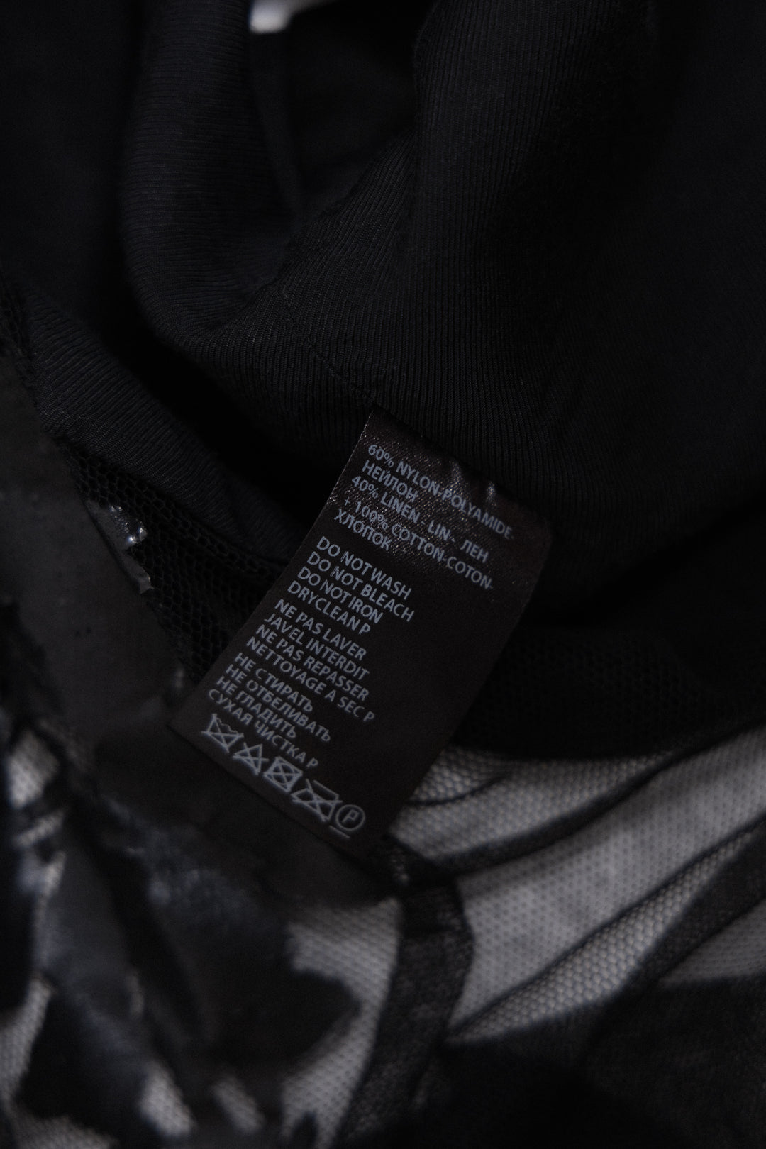 ANN DEMEULEMEESTER - SS14 Button up vest with a mesh back and