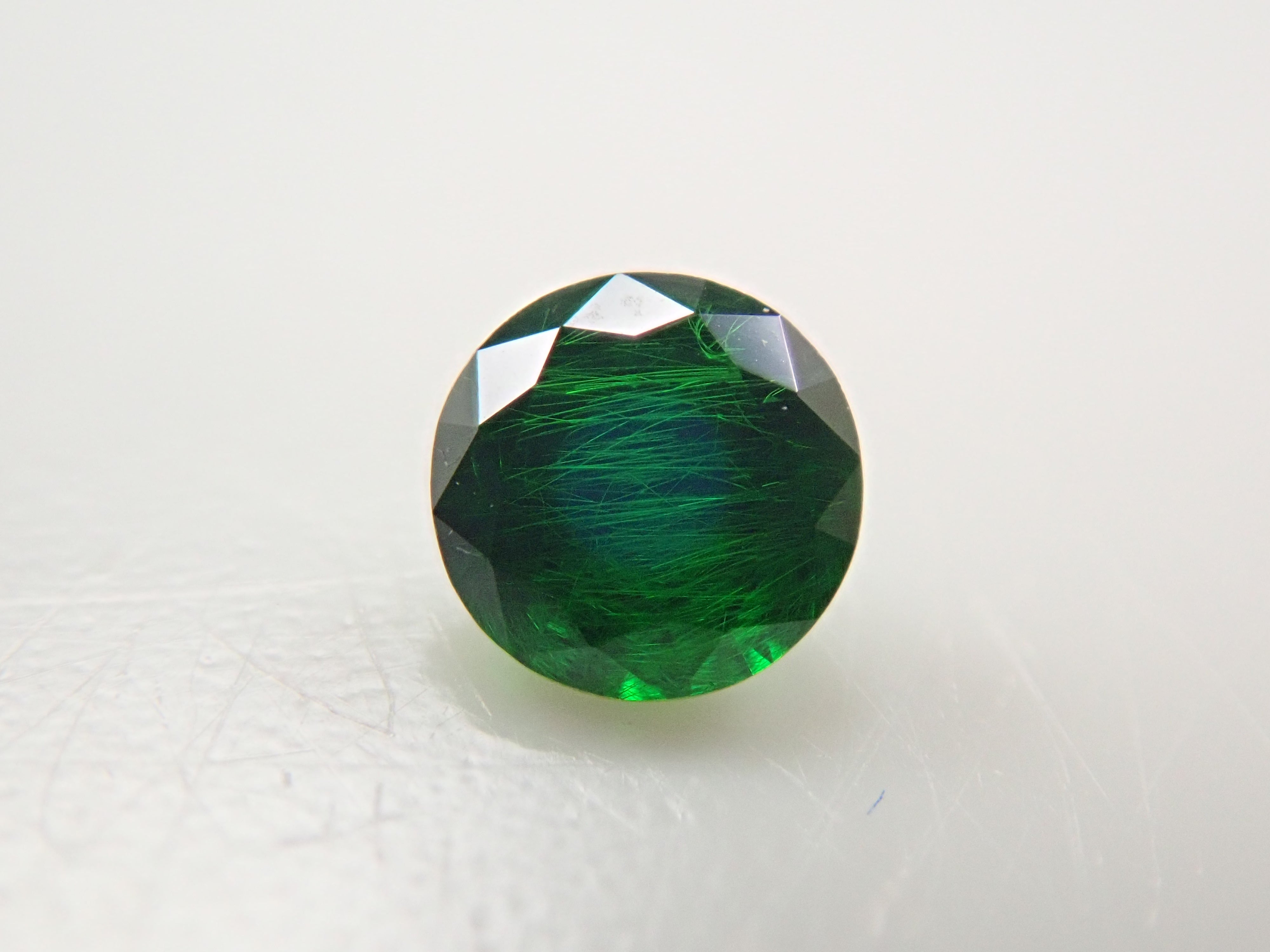 ロシア産デマントイドガーネット（ホーステール認む） 0.063ctルース