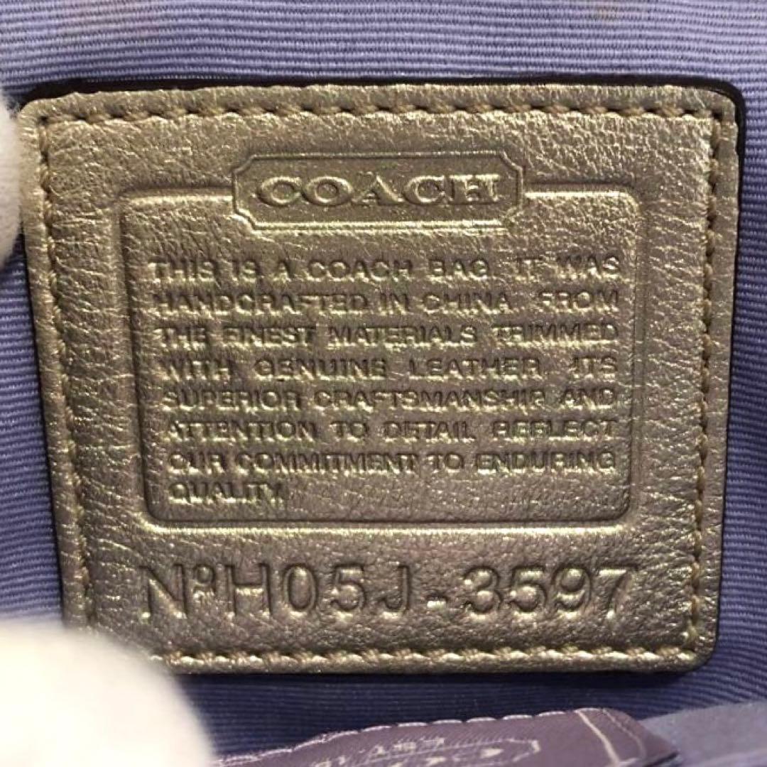 コーチ レザー ミニ ハンドバッグ シグネチャー キャンバス ガマ口