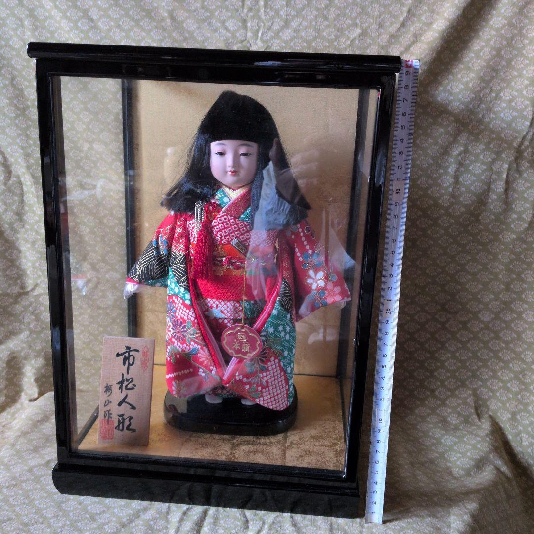 市松人形 赤緑衣装 黒髪ロング - メルカリ