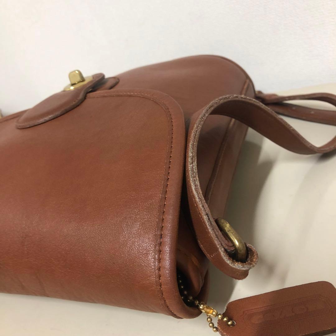 COACH ショルダーバッグ クロスボディ バケツ型 レザー 茶色　ターンロック