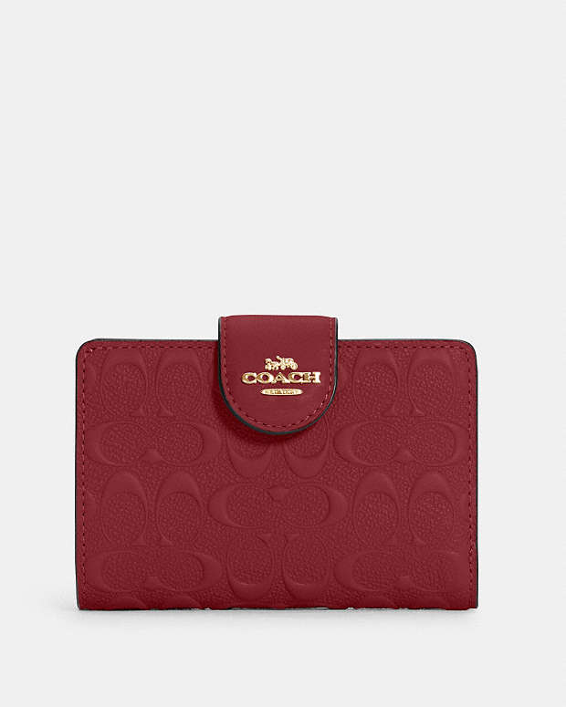 ミディアム コーナー ジップ ウォレット シグネチャー レザー ミニ財布